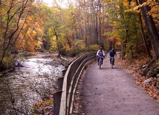 Bikers on Towpath Trail Next to Cuyahoga River