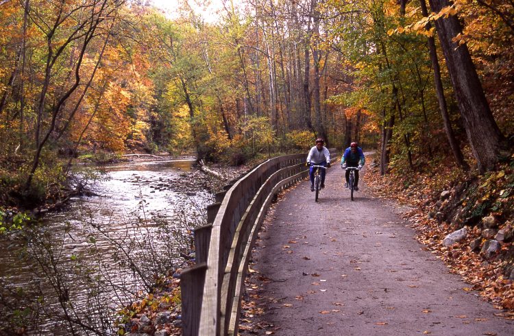 Bikers on Towpath Trail Next to Cuyahoga River