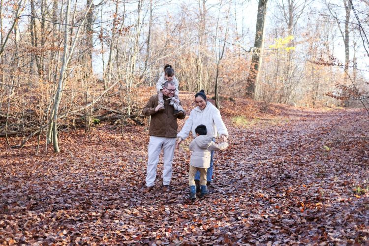 Family Walking through a wooded trail